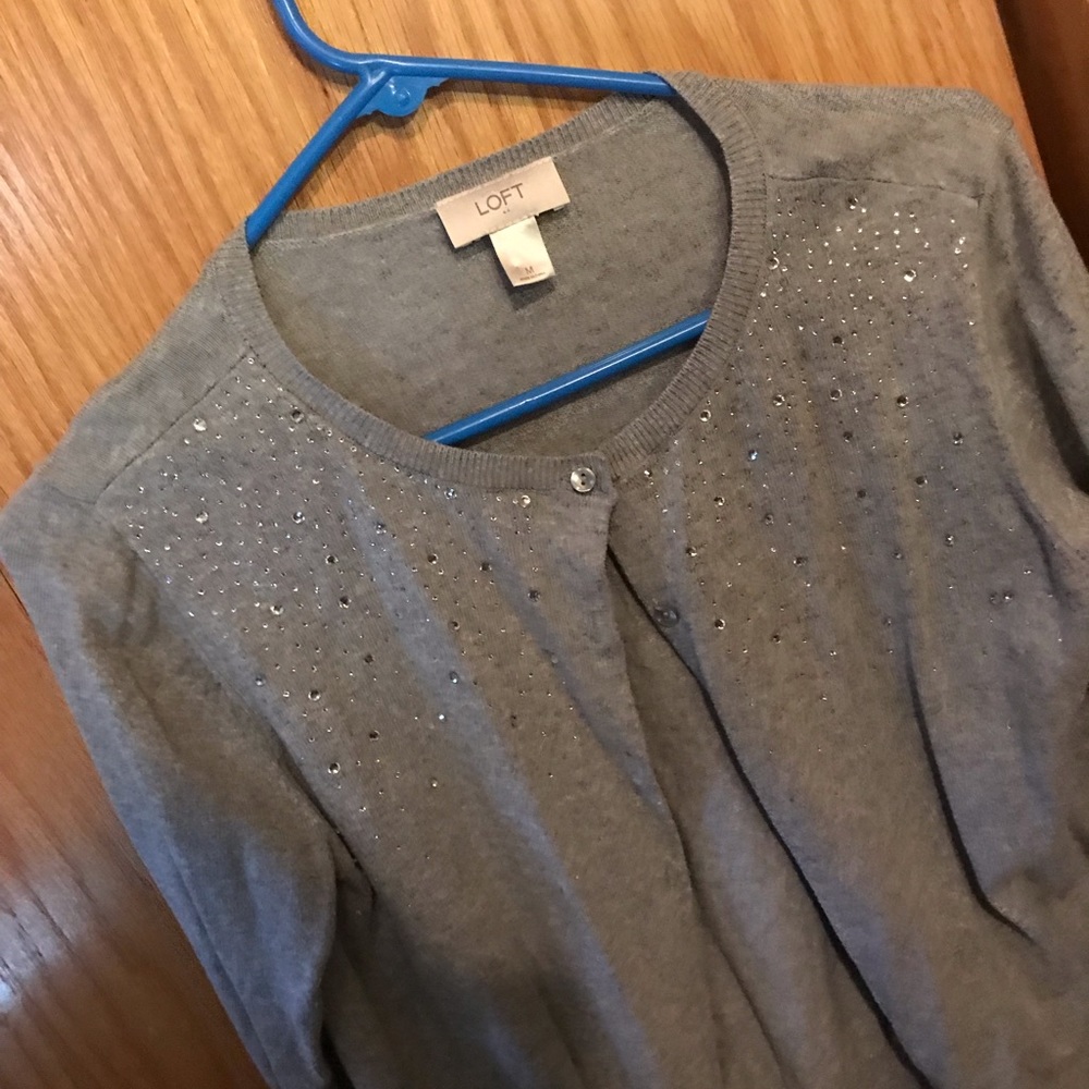 Gray sweater with rhinestone detail
